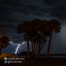 Lightning sparks by the St. Johns River.