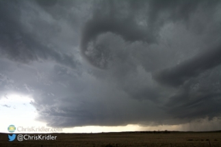 Clouds curled overhead as we watched the rotation to the south.