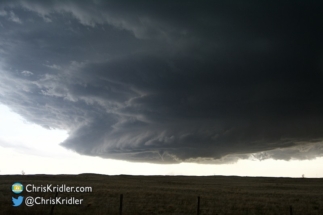 After much strong rotation, a funnel cloud formed.