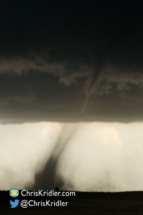 An ethereal tube above the dust.