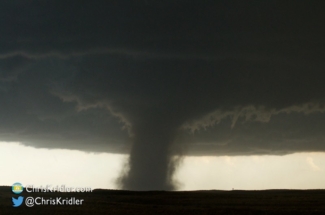 A small funnel moved around the big one.