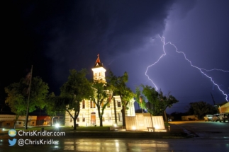 Lightning spangles the sky behind the Throckmorton County Courthouse.