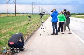 The group was happy after seeing a tornado in open country - the best kind.