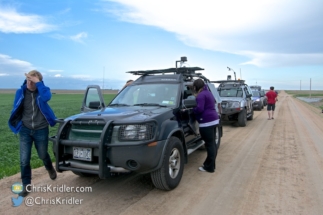 We waited on the dirt road and watched storms developing to the south.