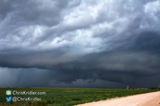 The tornado, at left, elongated into an elephant trunk.