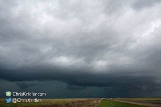 Farther down the road, this was the view to the north - green thanks to hail.