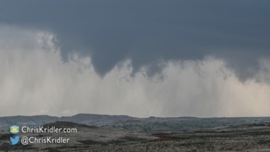 An initial funnel and possible tornado formed.