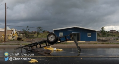 A trailer was tossed into the road.