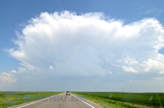 Here's a shot of the growing storm near Ness City, as seen out the windshield.