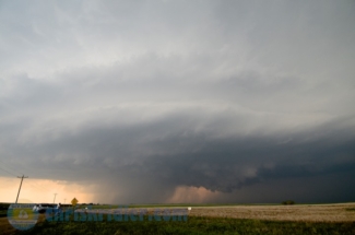 A succession of wall-cloud-type features formed.