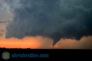 The backlit tornado kept grinding away.