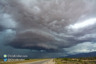 The storm crosses the highway.