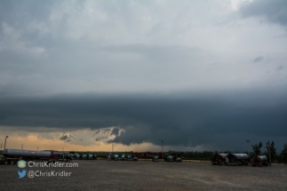 Amid grungy visibility, there appeared to be a hint of a wall cloud.