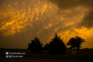 The setting sun lit up the mammatus clouds.