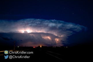 The pretty storm as seen from the west, active with lightning.