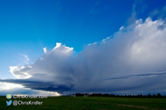 Beams of light and spinning structure, along with inflow.