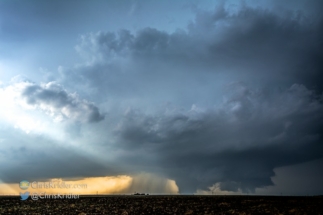 A closer shot of the structure with the tornado.