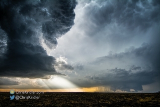 Tiny tornado under the supercell - and another storm encroaching.