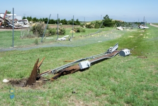 Telephone poles and fences were ripped apart by the tornado.