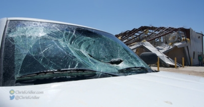 Damaged building, damaged truck post-tornado.01