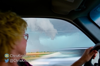 Peggy drives her Prairie Schooner, trying to stay ahead of the hail core.