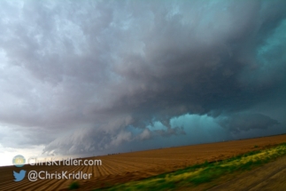 This was shot as we fled south on 87. Nice "greenage" in the hail core!