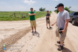 The boys let the prognosticating wind blow the dirt, "Twister" style.