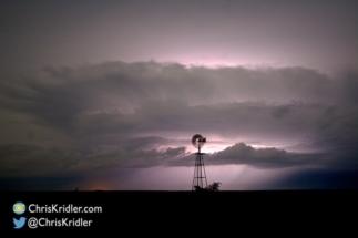 And a parting shot shows lightning illuminating the storm behind the windmill.