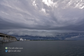 The shelf cloud, as seen from the 520 causeway, moves east over Cocoa, Florida.