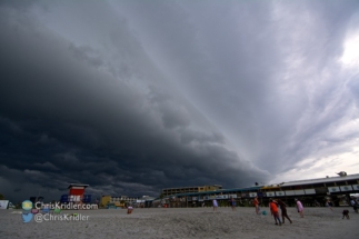 The tourists didn't seem to mind the storm, but the rain hadn't come yet.