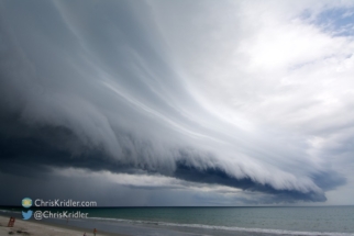 The beach cleared out as the storm moved overhead.