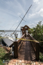 Dock damage and another marooned boat in Cocoa Village.