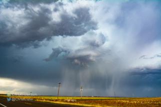 The white shafts are hail falling.