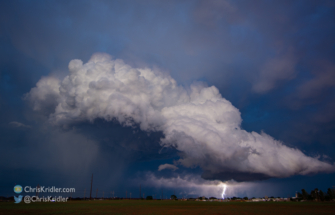 The dying storm dumped its hail and threw out a few lightning bolts.