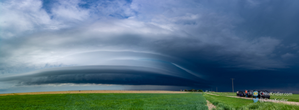 Storm chasers lined up to watch the storm.