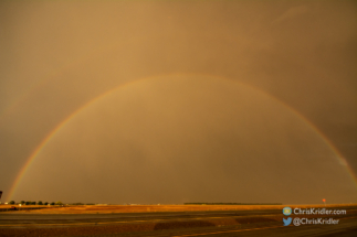 As rain and hail fell, we saw an otherworldly rainbow.