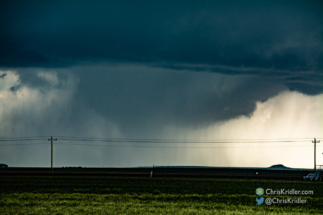 A cone-shaped funnel formed and was quickly wrapped in rain.