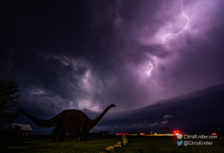 A nice lightning crawler over the dinosaur sculpture.