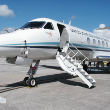 MacDILL AIR FORCE BASE, TAMPA, FLORIDA, SEPT. 2, 2004 - One of NOAA&#039;s Gulfstream IV hurricane hunter jets sits on the runway after a nearly 9-hour overnight flight around the periphery of Hurricane Frances in the Caribbean to gather data on the hurricane. The Muppet Gonzo is depicted on the airplane along with a hurricane.