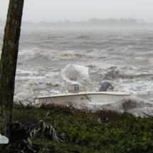 Amazing waves on the Indian River Lagoon swamp a boat in Hurricane Frances.