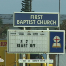 The First Baptist Church in Cocoa Beach lost its steeple in Frances - and had a sense of humor about it.