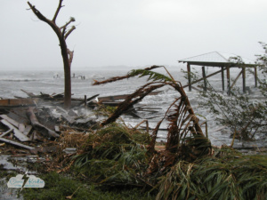 Huge waves damage a boathouse in Rockledge, Florida, and push debris onto the shores of the Indian River Lagoon around 9 a.m. Sept. 26, 2004, as Hurricane Jeanne passed through.